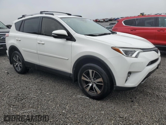 2018 Toyota RAV4 XLE with VIN JTMWFREV3JJ746262, listed as a Copart auction lot 51811035 with 84,319 mi miles and Salvage Title. Bid and sale history available at DreamBid. Image 4.