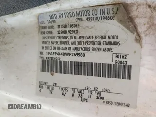 1998 Ford Mustang with VIN 1FAFP4448WF269580, listed as a Copart auction lot 54861155 with 304,869 mi miles and Salvage title. Bid and sale history available at DreamBid. Image 12.