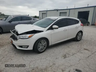2018 Ford Focus Titanium with VIN 1FADP3N23JL220344, listed as a Copart auction lot 54649765 with 123,947 mi miles and Salvage title. Bid and sale history available at DreamBid. Image 1.