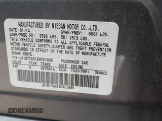2014 Infiniti Q50 Premium with VIN JN1BV7AR1EM701665, listed as a IAAI auction lot 41276373 with 113,820 mi miles. Bid and sale history available at carsss.com. Image 9.