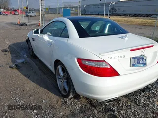 2014 Mercedes-Benz SLK 250 with VIN WDDPK4HA2EF085432, listed as a IAAI auction lot 41141812 with 65,718 mi miles and . Bid and sale history available at DreamBid. Image 3.