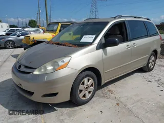 2009 Toyota Sienna CE with VIN 5TDZK23C09S251520, listed as a IAAI auction lot 42155604 with 233,153 mi miles. Bid and sale history available at carsss.com. Image 2.