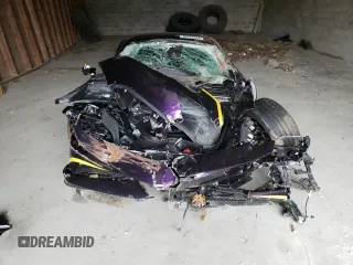 2023 Ferrari SF90 z VIN ZFF95NLA8P0299159, wystawiony jako Copart lot #52724044 z przebiegiem Nie podano mil oraz Szkody całkowita. Historia ofert i sprzedaży dostępna na DreamBid. Obrazek 5.