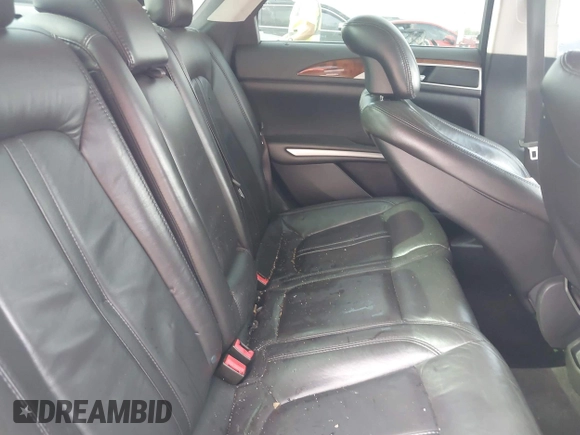 2014 Lincoln MKZ z VIN 3LN6L2GK3ER807586, wystawiony jako IAAI lot #42426125 z przebiegiem 198 281 mil mil oraz . Historia ofert i sprzedaży dostępna na DreamBid. Obrazek 8.