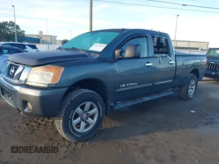 2010 Nissan Titan with VIN 1N6BA0FC1AN320629, listed as a IAAI auction lot 42491569 with 169,819 mi miles and . Bid and sale history available at DreamBid. Image 2.
