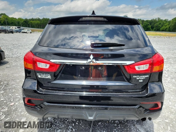 2018 Mitsubishi Outlander SE with VIN JA4AP3AW3JZ018567, listed as a Copart auction lot 57779155 with 79,864 mi miles and Salvage title. Bid and sale history available at DreamBid. Image 6.