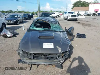2004 Ford Mustang Standard z VIN 1FAFP40684F194867, wystawiony jako IAAI lot #39963442 z przebiegiem Nie podano mil oraz . Historia ofert i sprzedaży dostępna na DreamBid. Obrazek 6.