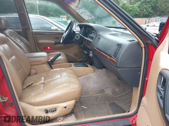 1996 Jeep Grand Cherokee Limited with VIN 1J4GZ78YXTC295872, listed as a IAAI auction lot 42339960 with 265,609 mi miles and . Bid and sale history available at DreamBid. Image 5.
