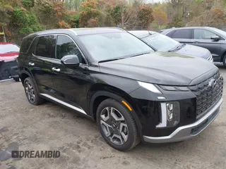 2024 Hyundai Palisade SEL z VIN KM8R4DGE5RU749463, wystawiony jako IAAI lot #41942800 z przebiegiem 11 962 mil mil oraz . Historia ofert i sprzedaży dostępna na DreamBid. Obrazek 1.