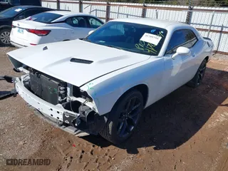 2021 Dodge Challenger SXT with VIN 2C3CDZAG1MH560522, listed as a IAAI auction lot 41709759 with 32,384 mi miles. Bid and sale history available at carsss.com. Image 19.