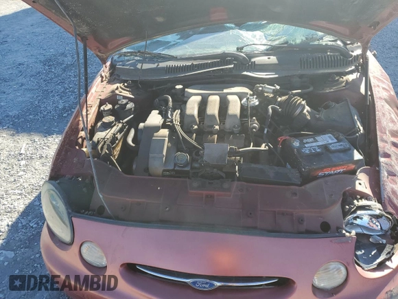 1998 Ford Taurus z VIN 1FAFP52S5WA261151, wystawiony jako Copart lot #83960754 z przebiegiem 135 049 mil mil oraz Szkoda całkowita • Salvage title. Historia ofert i sprzedaży dostępna na DreamBid. Obrazek 11.