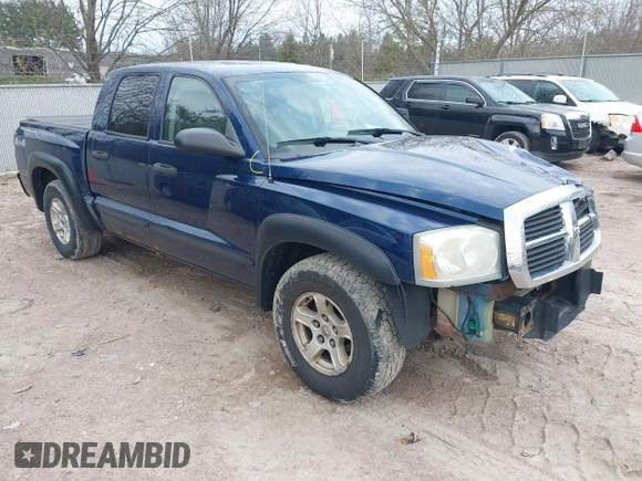 2005 Dodge Dakota SLT with VIN 1D7HW48N65S288584, listed as a IAAI auction lot 42130695 with 221,636 mi miles. Bid and sale history available at carsss.com. Image 1.