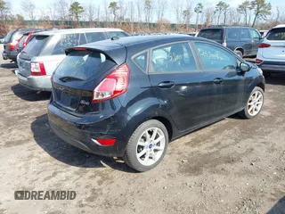 2019 Ford Fiesta SE with VIN 3FADP4EJ0KM136804, listed as a IAAI auction lot 41657106 with 999,999 mi miles. Bid and sale history available at carsss.com. Image 4.