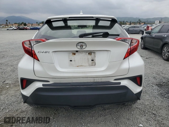2019 Toyota C-HR XLE with VIN JTNKHMBX9K1059561, listed as a Copart auction lot 53568795 with 58,912 mi miles and Salvage Title. Bid and sale history available at DreamBid. Image 6.