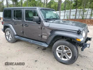 2020 Jeep Wrangler Unlimited Sahara with VIN 1C4HJXEN2LW149623, listed as a Copart auction lot 50906705 with 71,919 mi miles and Salvage title. Bid and sale history available at DreamBid. Image 4.