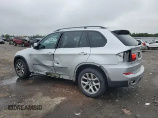 2012 BMW X5 35i with VIN 5UXZV4C57CL747717, listed as a Copart auction lot 63003135 with 135,999 mi miles and Clean title. Bid and sale history available at DreamBid. Image 2.