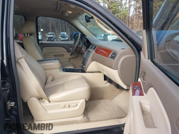 2012 GMC Yukon SLT with VIN 1GKS1CE06CR104447, listed as a IAAI auction lot 41589823 with 183,003 mi miles. Bid and sale history available at carsss.com. Image 5.