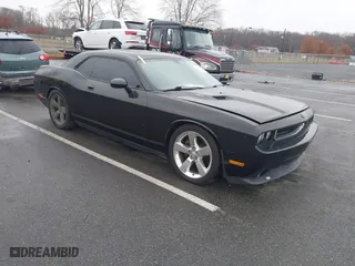 2009 Dodge Challenger R/T with VIN 2B3LJ54TX9H614141, listed as a IAAI auction lot 40774063 with 78,150 mi miles. Bid and sale history available at carsss.com. Image 1.