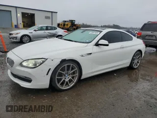 2012 BMW 6 Series 650i with VIN WBALX3C58CDV77547, listed as a Copart auction lot 43697455 with 95,697 mi miles and Salvage Title. Bid and sale history available at carsss.com. Image 1.