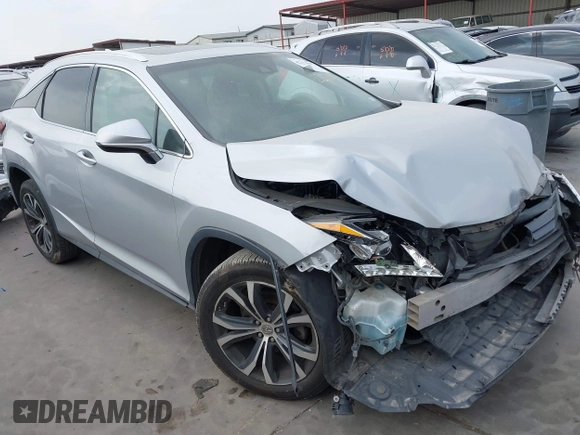 2017 Lexus RX 350 z VIN 2T2ZZMCAXHC052984, wystawiony jako IAAI lot #42273947 z przebiegiem 128 019 mil mil oraz . Historia ofert i sprzedaży dostępna na DreamBid. Obrazek 1.