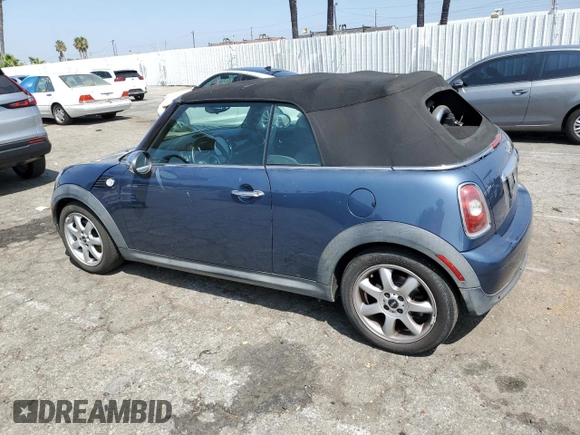 2010 MINI Convertible with VIN WMWMR3C51ATU97217, listed as a Copart auction lot 67732714 with 127,880 mi miles and Clean Title. Bid and sale history available at DreamBid. Image 2.