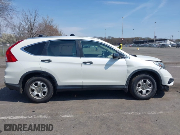 2015 Honda CR-V LX with VIN 5J6RM4H39FL032027, listed as a IAAI auction lot 42013029 with 79,210 mi miles and . Bid and sale history available at DreamBid. Image 13.