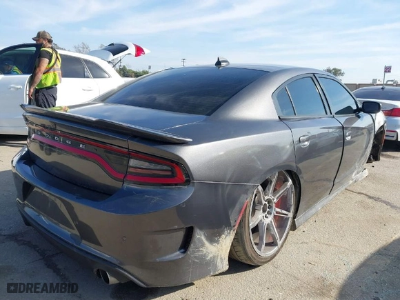 2017 Dodge Charger R/T with VIN 2C3CDXCT3HH635225, listed as a IAAI auction lot 41551772 with 74,024 mi miles. Bid and sale history available at carsss.com. Image 4.