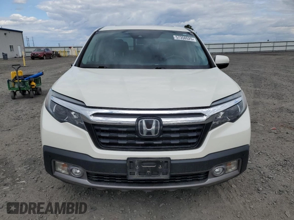 2019 Honda Ridgeline RTL-E with VIN 5FPYK3F74KB039057, listed as a Copart auction lot 57350525 with 105,102 mi miles and Salvage title. Bid and sale history available at DreamBid. Image 5.