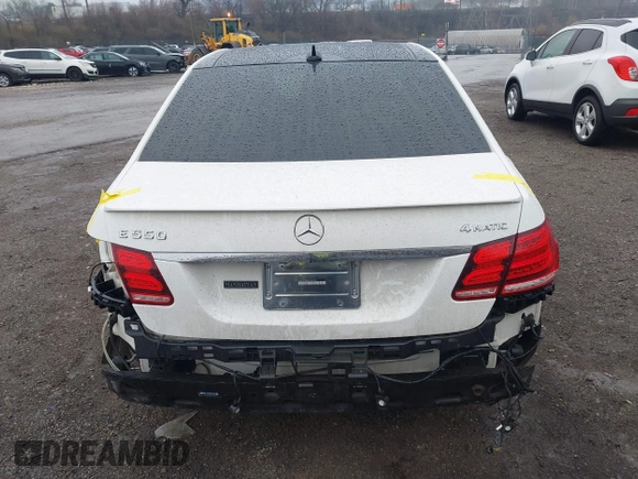 2014 Mercedes-Benz E 550 Sport with VIN WDDHF9BBXEA940995, listed as a IAAI auction lot 41872452 with 50,451 mi miles and . Bid and sale history available at DreamBid. Image 17.