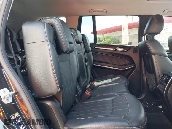 2014 Mercedes-Benz GL 450 z VIN 4JGDF7CE1EA342408, wystawiony jako IAAI lot #41968441 z przebiegiem 120 459 mil mil oraz . Historia ofert i sprzedaży dostępna na DreamBid. Obrazek 8.