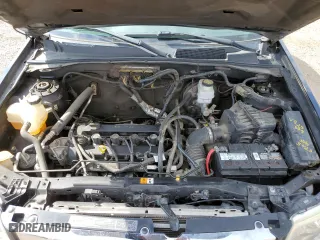 2010 Mazda Tribute Touring with VIN 4F2CY9C75AKM02945, listed as a Copart auction lot 67784674 with 134,363 mi miles and Salvage Title. Bid and sale history available at carsss.com. Image 12.