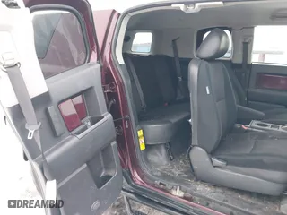 2007 Toyota FJ Cruiser with VIN JTEBU11FX70020977, listed as a IAAI auction lot 41603267 with 163,858 mi miles. Bid and sale history available at carsss.com. Image 8.