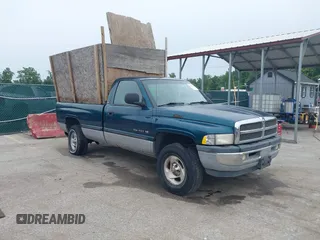 1999 Dodge 1500 z VIN 1B7HF16Z6XS286934, wystawiony jako IAAI lot #42331463 z przebiegiem 115 595 mil mil oraz . Historia ofert i sprzedaży dostępna na DreamBid. Obrazek 1.