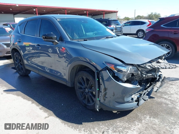 2021 Mazda CX-5 Touring with VIN JM3KFACM1M0317763, listed as a IAAI auction lot 41775712 with 75,068 mi miles. Bid and sale history available at carsss.com. Image 1.