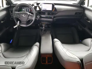 2023 Lexus UX 250h F Sport with VIN JTHB9JBHXP2065586, listed as a Copart auction lot 59037755 with 23,620 mi miles and Salvage title. Bid and sale history available at DreamBid. Image 8.