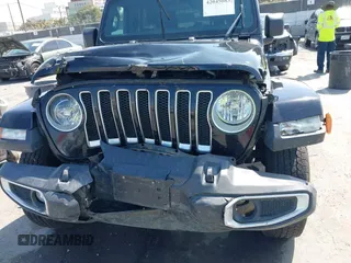 2020 Jeep Wrangler Unlimited Sahara with VIN 1C4HJXEN6LW235159, listed as a IAAI auction lot 42045083 with 68,400 mi miles and . Bid and sale history available at DreamBid. Image 12.