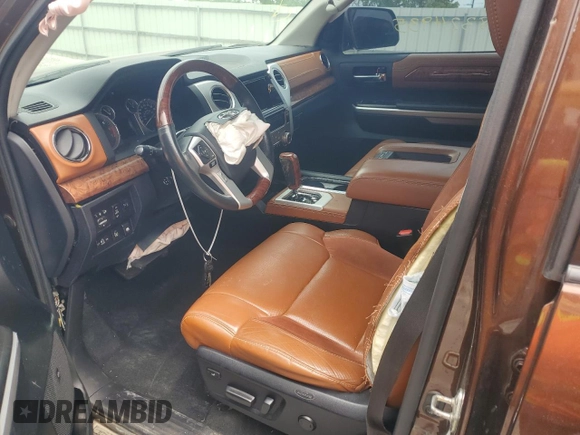2017 Toyota Tundra Platinum with VIN 5TFAY5F10HX606671, listed as a Copart auction lot 58324935 with 137,112 mi miles and Salvage title. Bid and sale history available at DreamBid. Image 7.