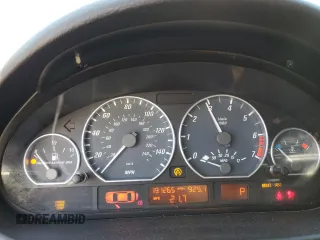 2003 BMW 3 Series 330Ci with VIN WBABN53433PH03075, listed as a Copart auction lot 77252924 with 191,265 mi miles and Salvage title. Bid and sale history available at DreamBid. Image 9.