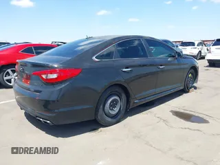 2015 Hyundai Sonata Sport with VIN 5NPE34ABXFH084893, listed as a IAAI auction lot 42066253 with 122,923 mi miles and . Bid and sale history available at carsss.com. Image 4.