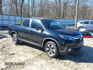 2018 Honda Ridgeline RTL-T with VIN 5FPYK3F69JB007131, listed as a IAAI auction lot 41375353 with 73,006 mi miles and . Bid and sale history available at DreamBid. Image 1.