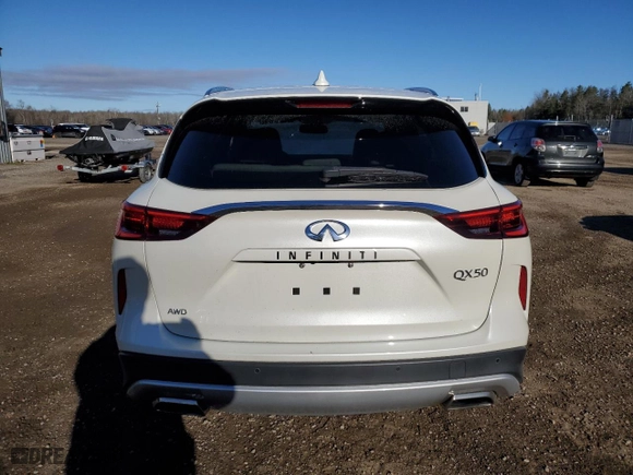 2019 Infiniti QX50 PURE with VIN 3PCAJ5M3XKF117625, listed as a Copart auction lot 80327304 with 99,585 mi miles and Clean Title. Bid and sale history available at carsss.com. Image 6.