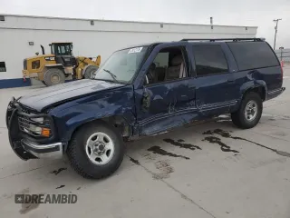 1999 GMC Suburban with VIN 1GDFK16R9XJ771458, listed as a Copart auction lot 43412175 with 159,328 mi miles and Salvage Title. Bid and sale history available at carsss.com. Image 1.