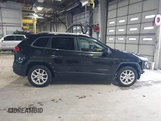 2015 Jeep Cherokee Latitude with VIN 1C4PJMCB5FW768854, listed as a IAAI auction lot 41246213 with 131,112 mi miles. Bid and sale history available at carsss.com. Image 13.
