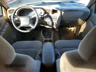 1999 Chevrolet Blazer LS с VIN 1GNCT18W1XK140616, выставлен на аукционе Copart как лот 78567434 с пробегом 244 356 миль миль и Чистый • Clean title. История ставок и продаж доступна на DreamBid. Изображение 8.