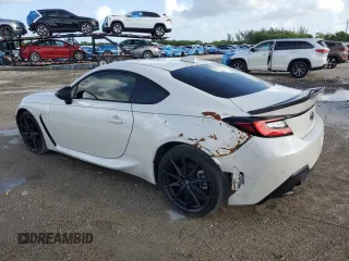 2023 Toyota 86 Premium z VIN JF1ZNBF13P8764107, wystawiony jako Copart lot #60854725 z przebiegiem 4 990 mil mil oraz Czysty tytuł • Clean title. Historia ofert i sprzedaży dostępna na DreamBid. Obrazek 2.