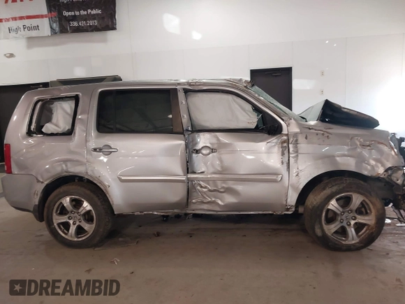 2014 Honda Pilot EX-L with VIN 5FNYF3H56EB024735, listed as a IAAI auction lot 41286284 with 101,221 mi miles. Bid and sale history available at carsss.com. Image 13.