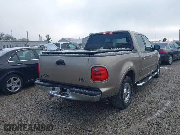 2003 Ford F-150 XLT with VIN 1FTRW07673KD34518, listed as a IAAI auction lot 41975405 with 95,775 mi miles. Bid and sale history available at carsss.com. Image 4.