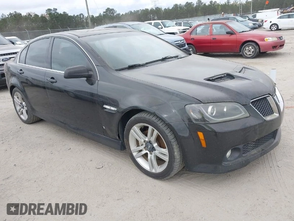 2009 Pontiac G8 with VIN 6G2ER57789L232134, listed as a IAAI auction lot 41864803 with 166,717 mi miles. Bid and sale history available at carsss.com. Image 1.