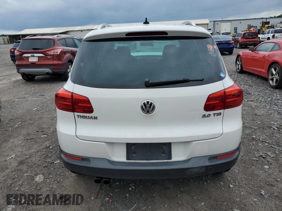 2014 Volkswagen Tiguan SE z VIN WVGAV3AX5EW551477, wystawiony jako Copart lot #55773245 z przebiegiem 153 437 mil mil oraz Czysty tytuł • Clean title. Historia ofert i sprzedaży dostępna na DreamBid. Obrazek 6.