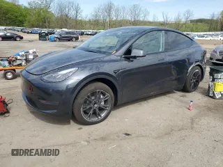 2025 Tesla Model Y Long Range with VIN 7SAYGDED7SF320702, listed as a Copart auction lot 54655325 with 1,169 mi miles and Salvage Title. Bid and sale history available at DreamBid. Image 1.